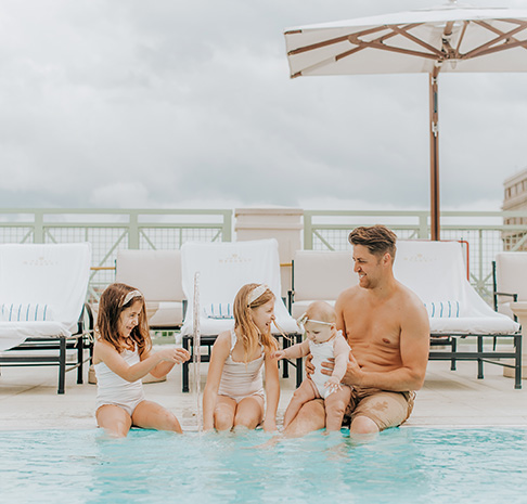 Family in pool