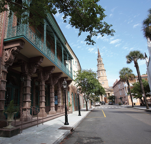 View of street with historic buildings and church