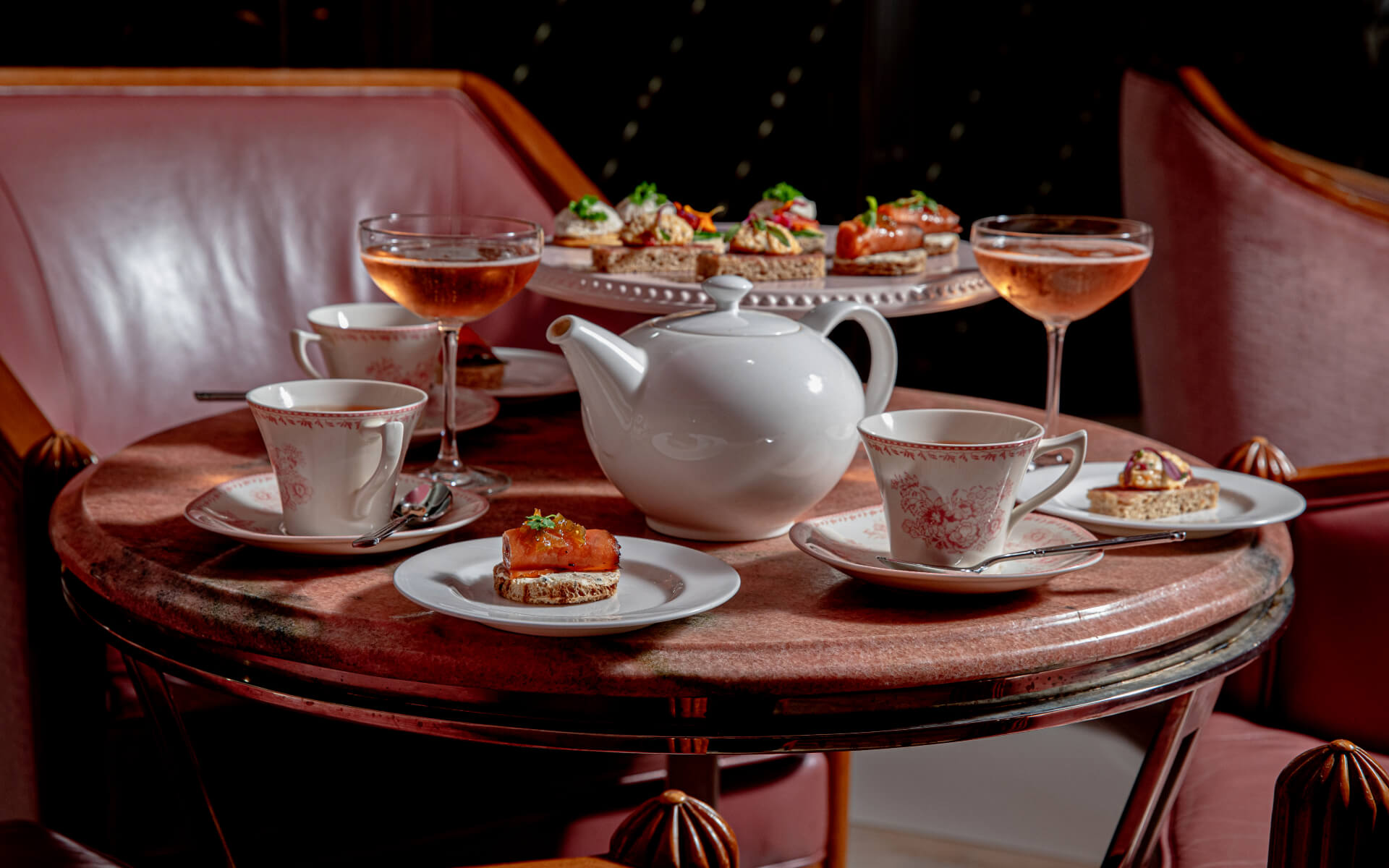 A tea set with an assortment of side dishes
